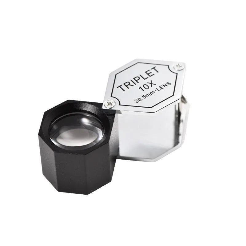 Handheld portable magnifying glass with metal body for jewellery and coin inspection