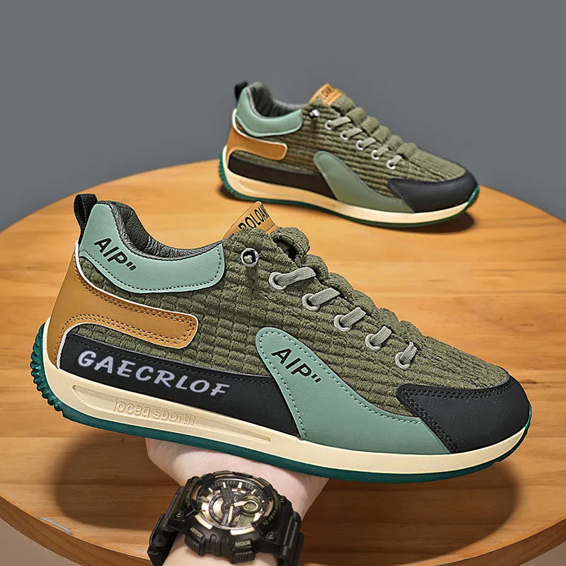 Men's green and grey lightweight mesh running shoes with lace-up front and round toe.