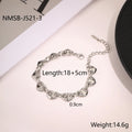 Women's geometric hollowed-out heart bracelet in stainless steel, available in gold or steel colour.