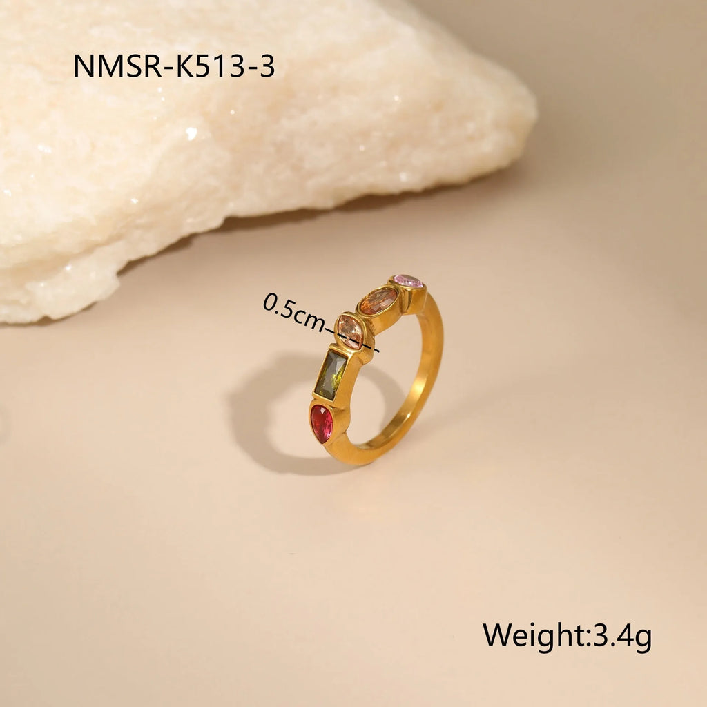 Geometric gold plated jewellery set with zircon accents including necklace, ring, and earrings