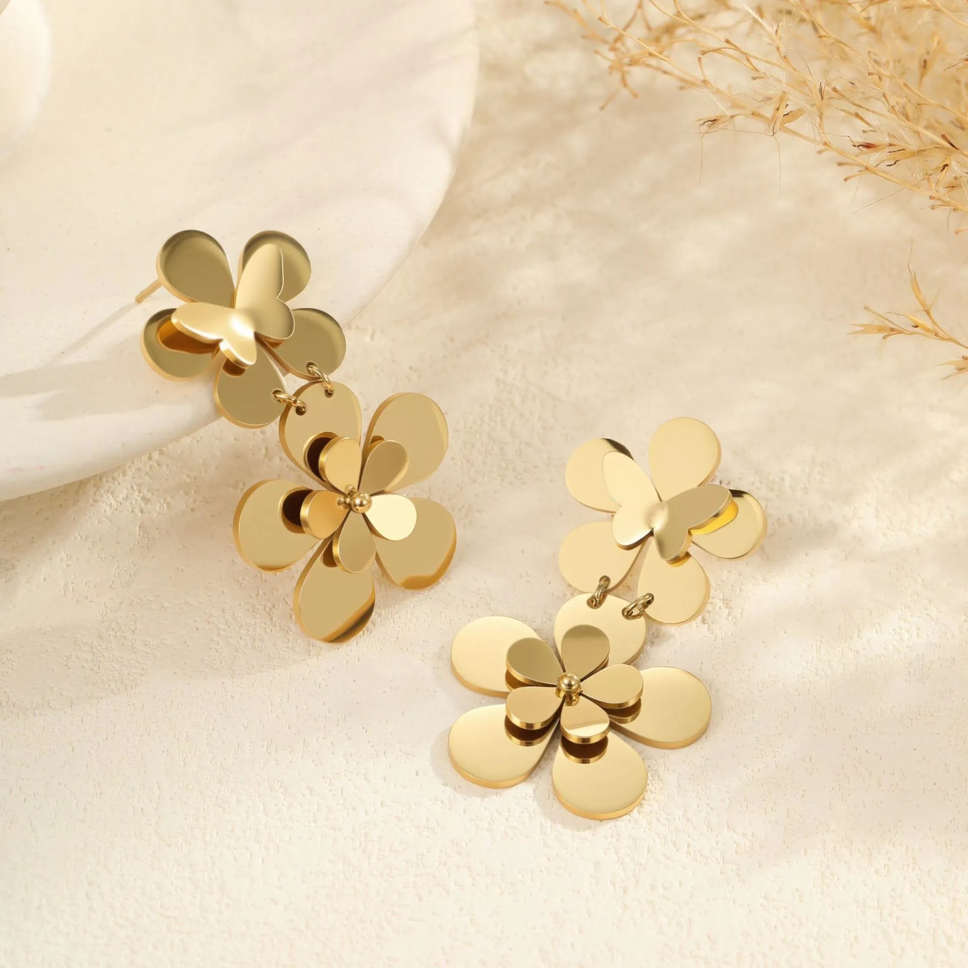 Gold flower butterfly earrings made from stainless steel with 18K electroplated finish