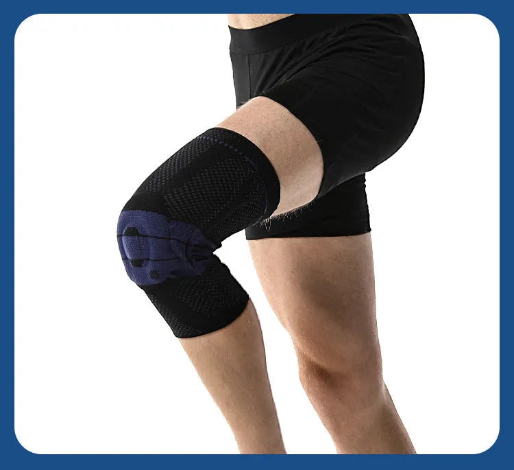 Adult sports knee pads in black and blue colour, shown on a knee for size reference.