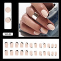 W644 black and white frosted matte press-on false nails set on a hand