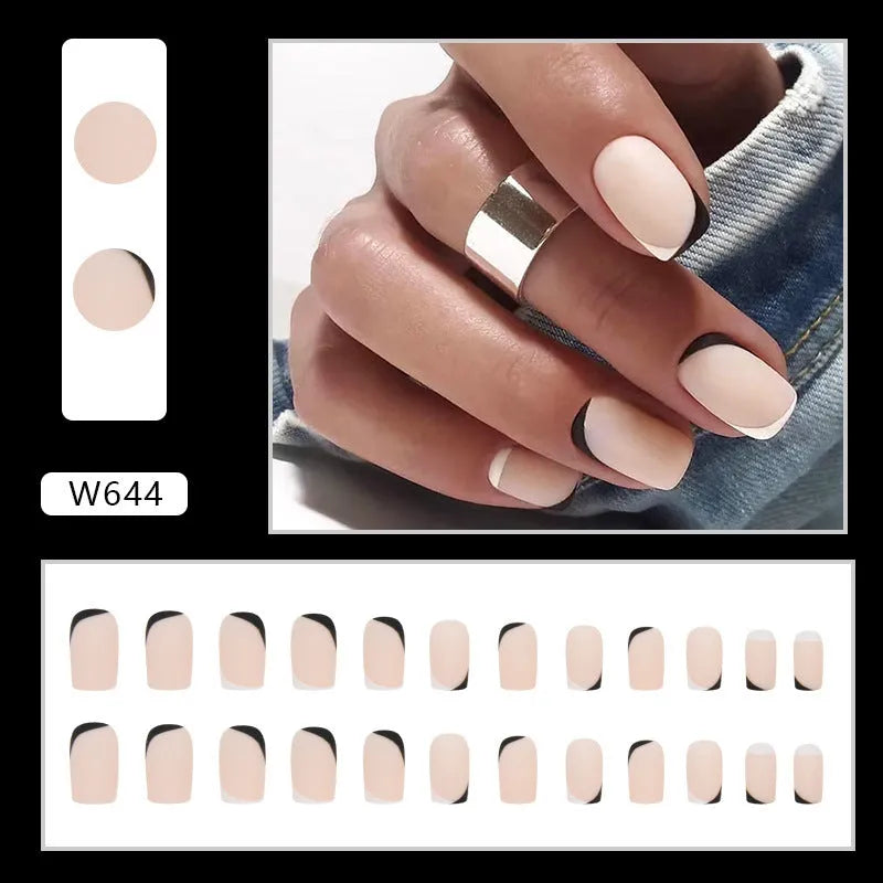 W644 black and white frosted matte press-on false nails set on a hand