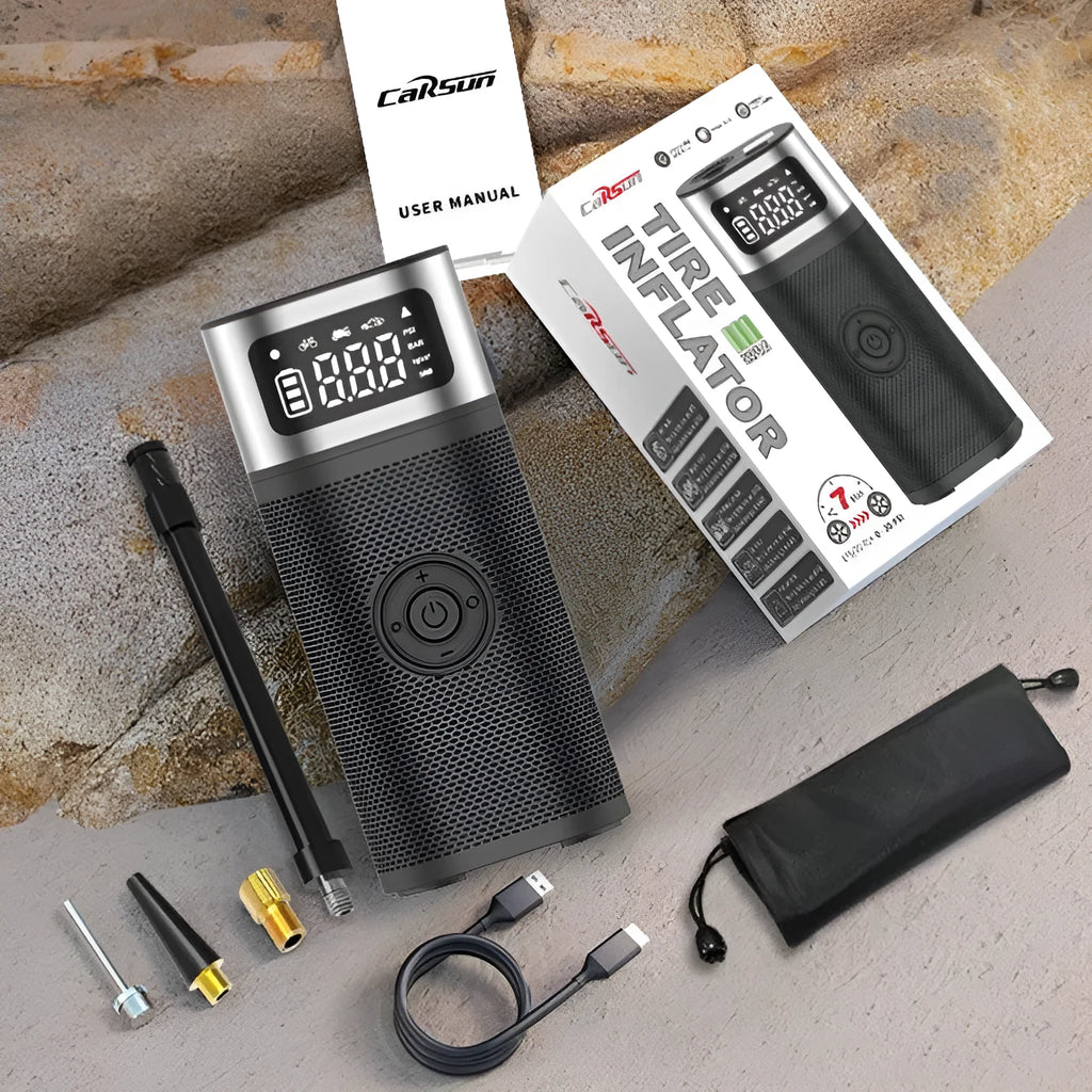 Black portable wireless air pump with 15cm tube, USB charging cable, and multiple nozzles for different inflation needs