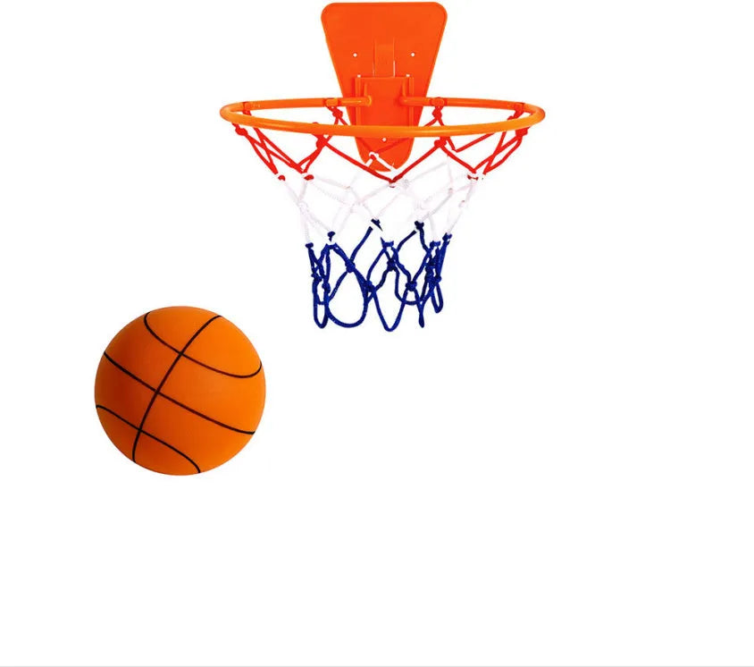 Silent high density foam sports ball in assorted bright colours next to a basketball frame.