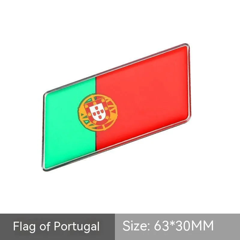 Aluminium metal car sticker with national flag design in a parallelogram shape.