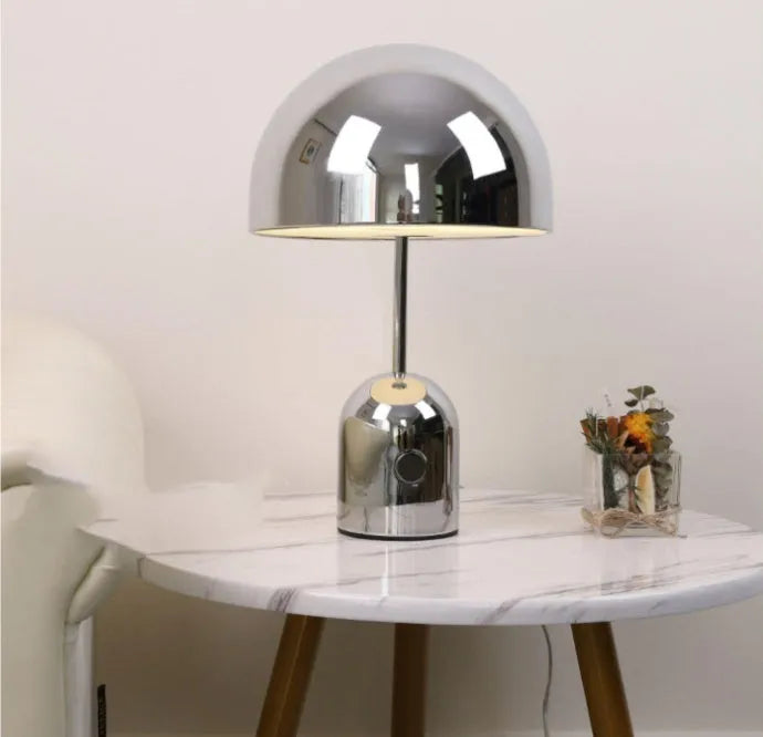 Mushroom-shaped table lamp with metal base in rose gold finish
