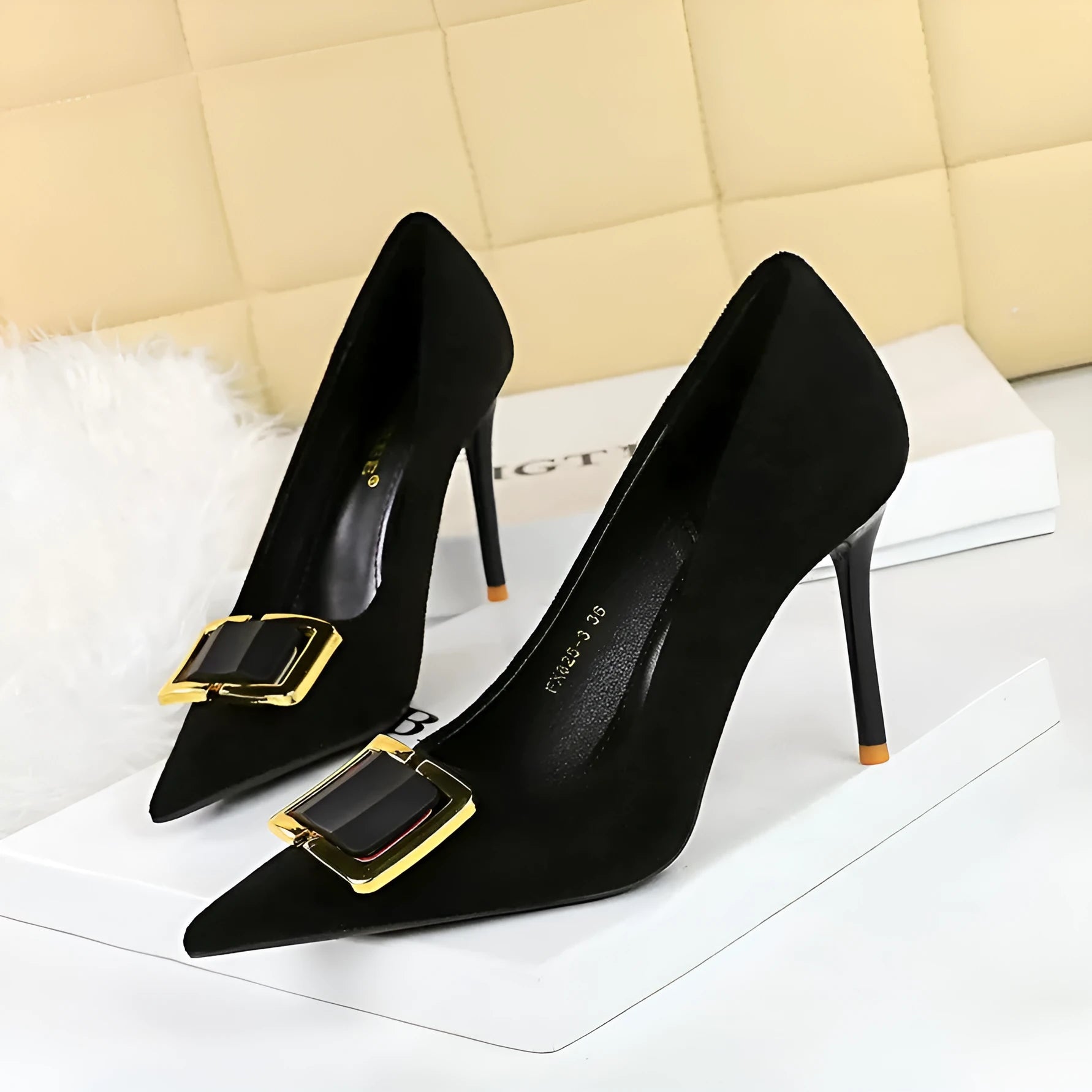 Black suede women's stiletto high heels with a pointed toe and thin 9cm heel.