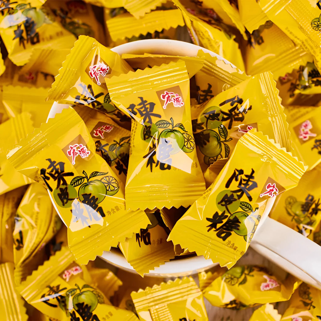 Assortment bag containing three separate packets of Plum Sugar, Guava, and Tangerine Peel flavoured hard candy.