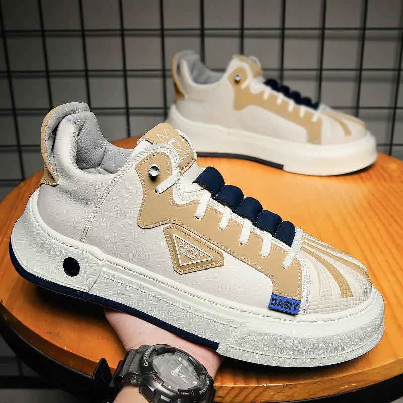Men's beige low-top sneakers with elastic band closure and leather stitching detailing