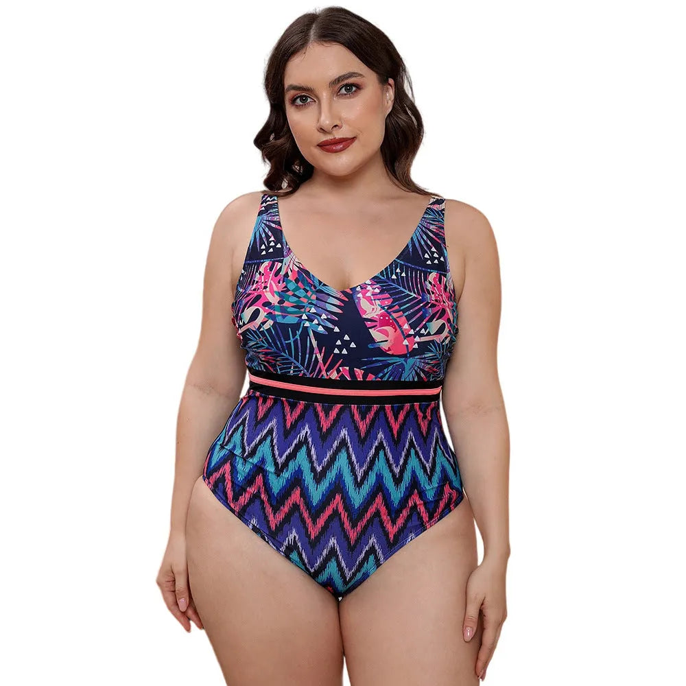 Women's blue printed one-piece swimsuit with spaghetti straps and a striped vest design