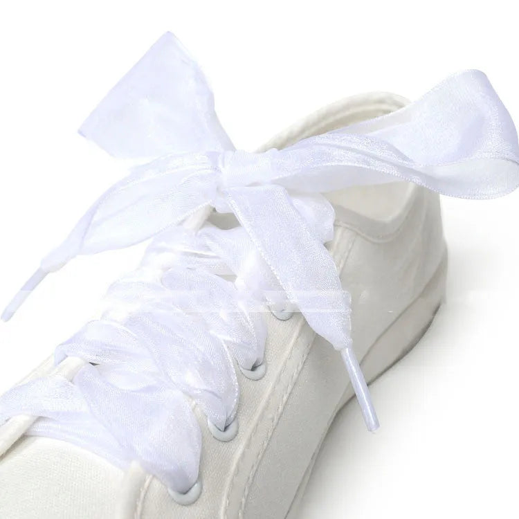 Wide transparent lace shoelaces in multiple solid colours showing 4cm width and length.