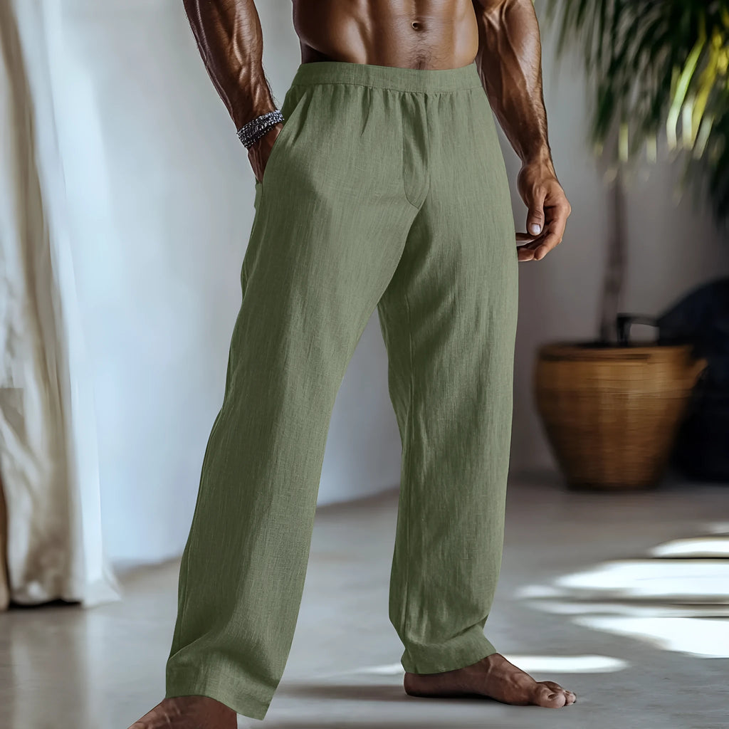 Cotton and linen straight-leg casual trousers in a solid colour with pockets, showing British style fit.