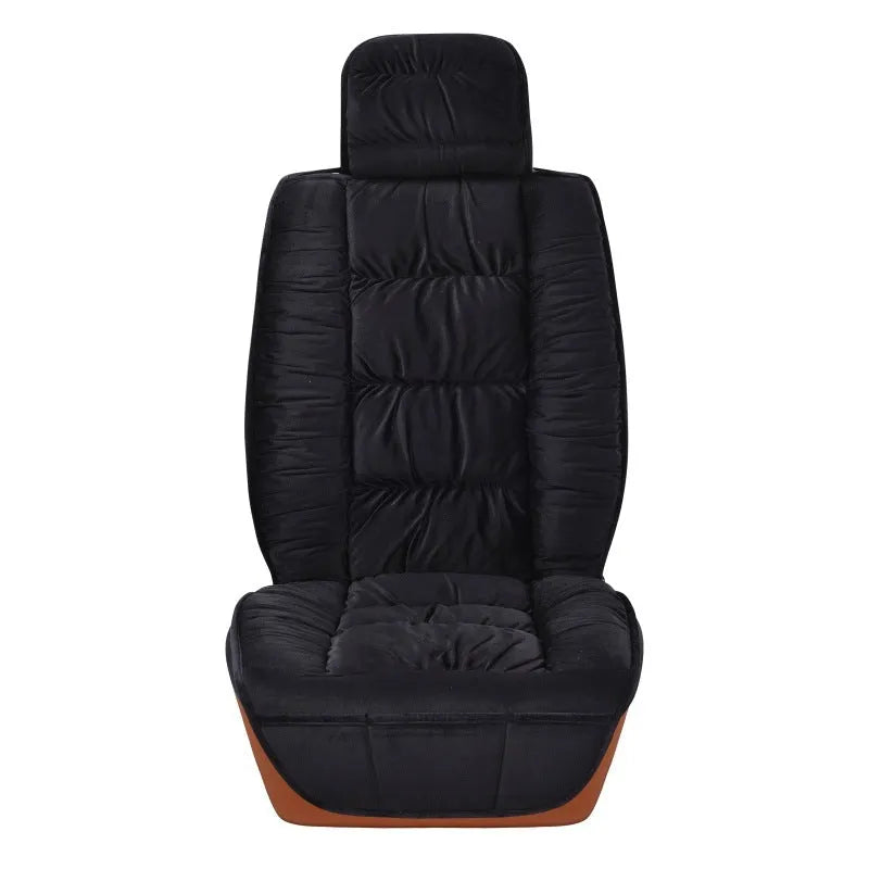 Short plush winter car seat cushion in grey, shown on a car seat.