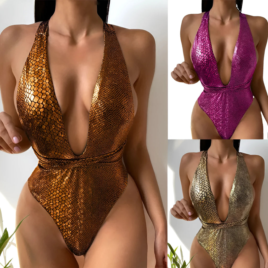 Women's sequined one-piece swimsuit on a mannequin, showing the solid colour and glittering design.