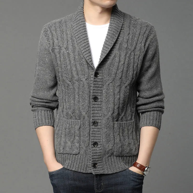 Men's knitted cardigan in jacquard pattern, shown in a neutral colour with a straight cut and open front.