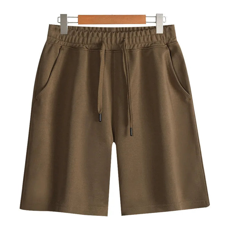 Cotton sports shorts with straight-leg cut available in multiple colours and sizes including extended fits