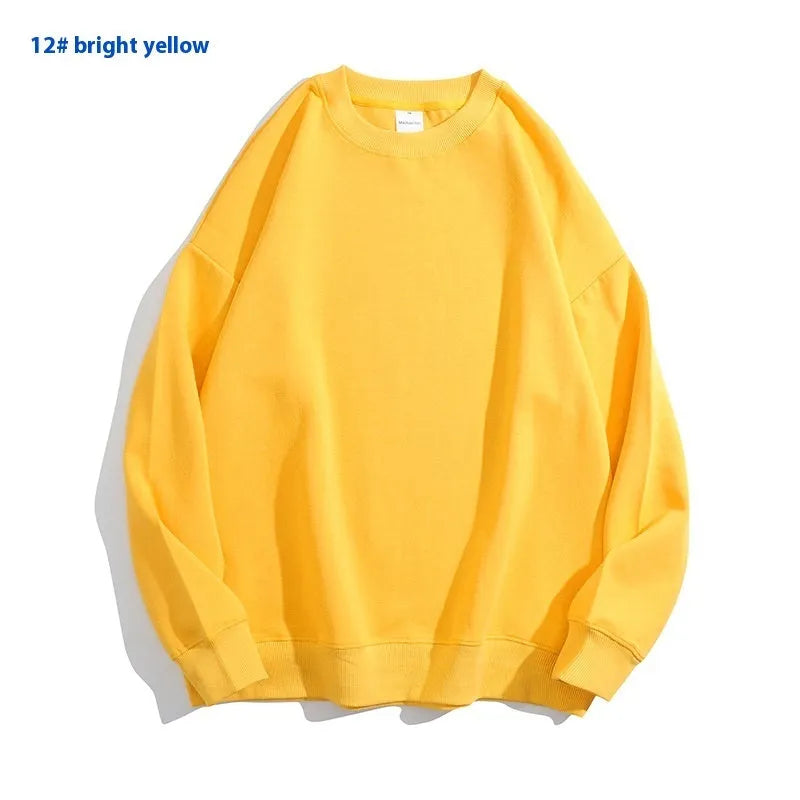 Women's loose fit cotton off shoulder sweater in a solid colour on a hanger.