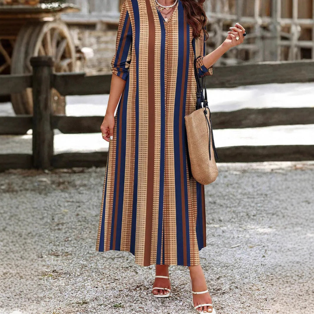 Camel coloured vertical striped V-neck dress with A-line skirt and long sleeves