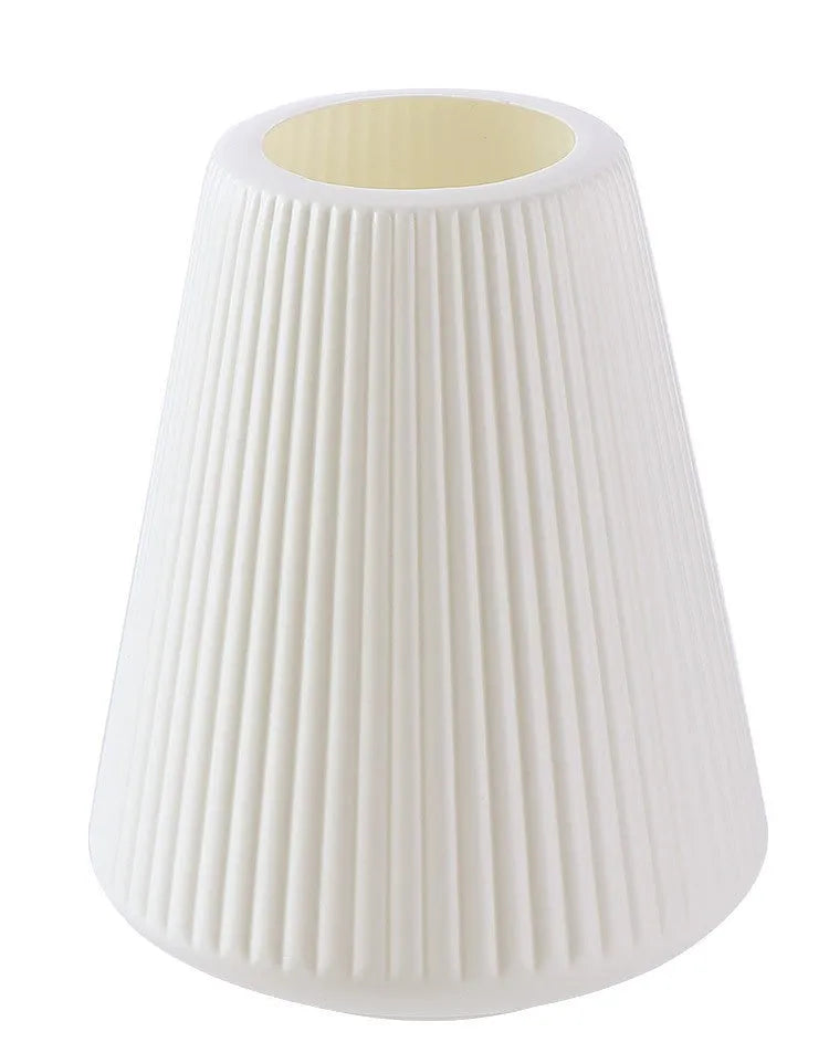 Colourful melamine plastic decorative flower vase measuring 16cm by 20cm on a desktop.