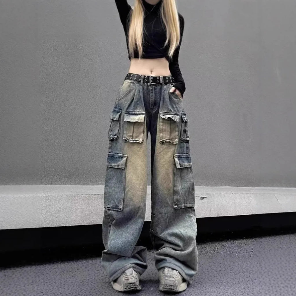 Loose fit denim pants with multiple pockets in washed distressed light blue finish