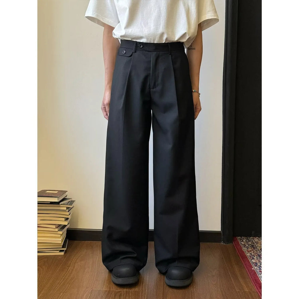 Men's brown straight-leg casual trousers with wide-leg drape fit on hanger