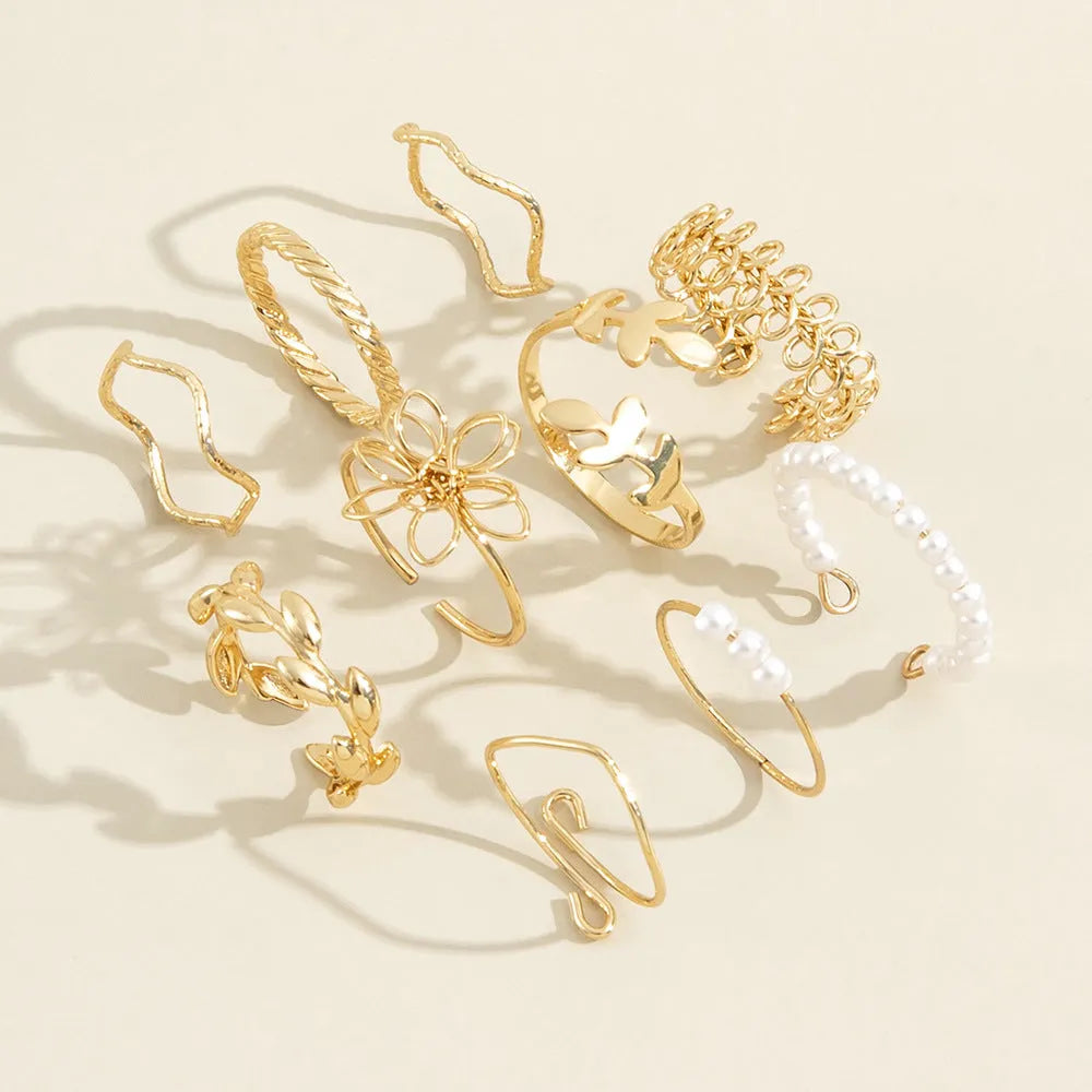 Gold openwork flower ring set for women with intricate floral designs
