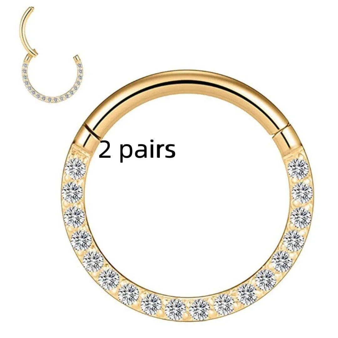 Stainless steel seamless nose rings showing steel, gold, rose gold, and black electroplated finishes with round design