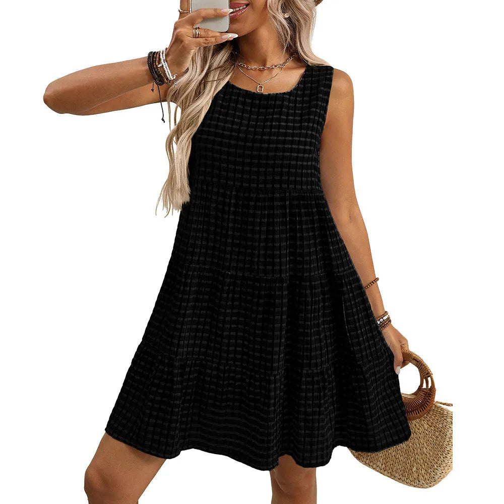 Women's light blue sleeveless plaid dress with an oversized swing skirt and high waist.