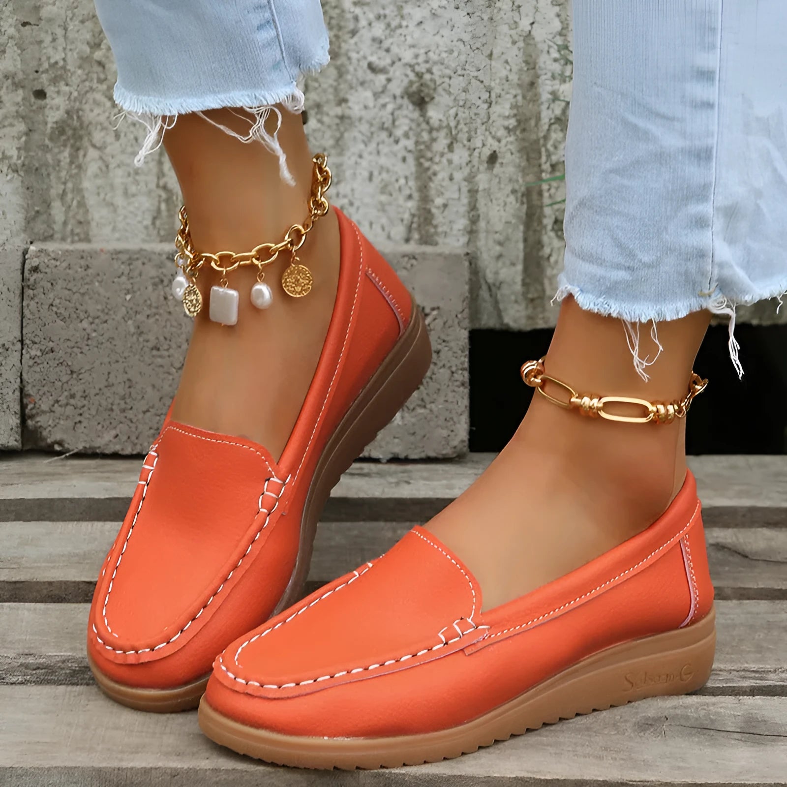 Women's flat slip-on loafers in PU leather, showing round toe and available colour options