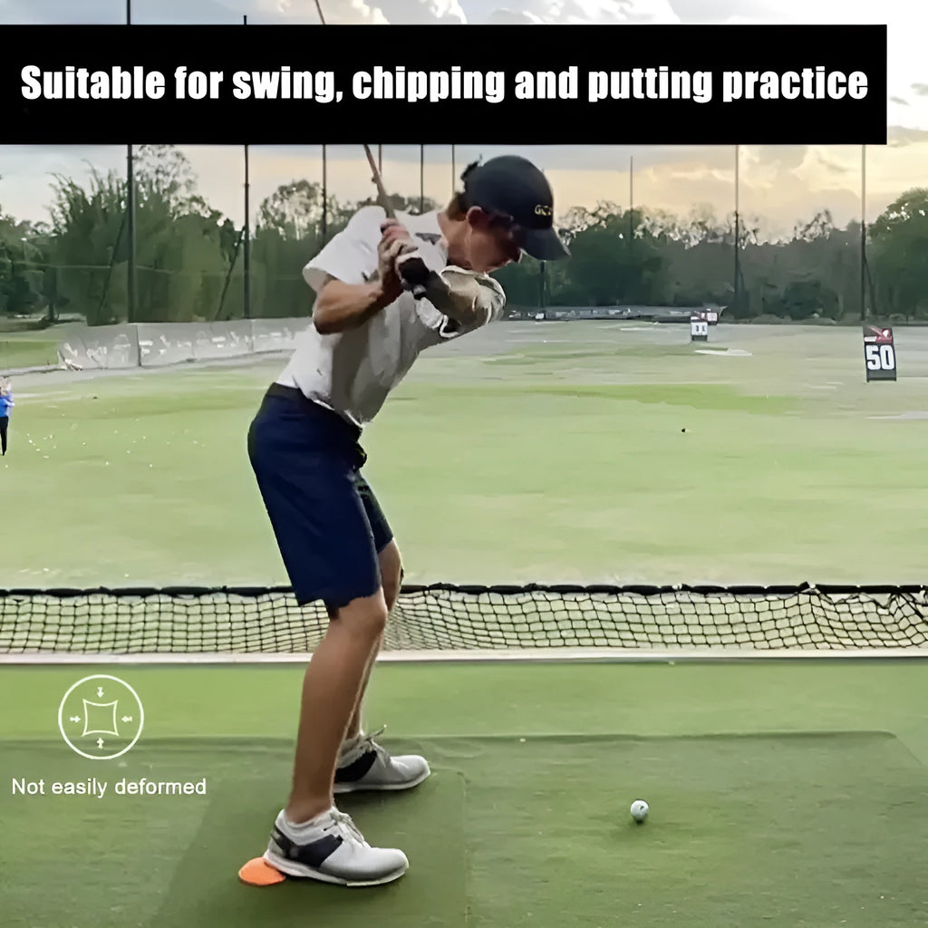 Orange natural rubber golf centre of gravity training mat on practice surface