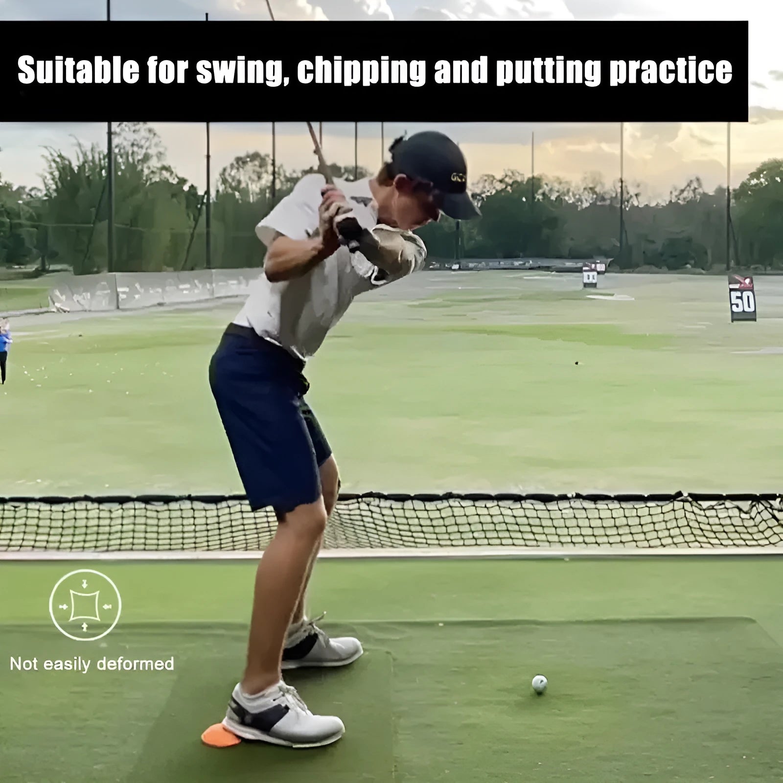 Orange natural rubber golf centre of gravity training mat on practice surface