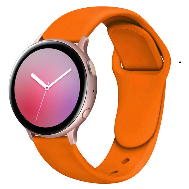 Samsung Galaxy Active 2 smartwatch with black silicone sports strap featuring a reverse buckle.