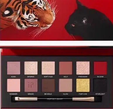 Twelve-colour animal eye shadow plate showing seven wild animal designs including golden tiger and leopard patterns