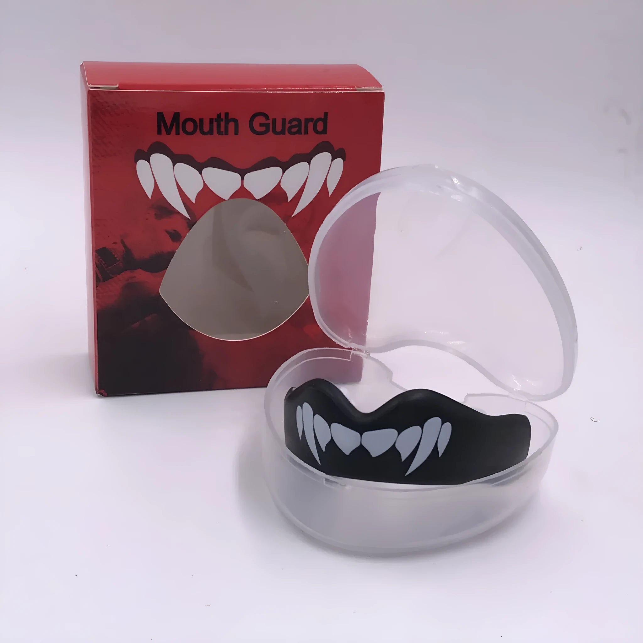 Adult boxing mouthguard with printed teeth design for martial arts and Taekwondo protection.