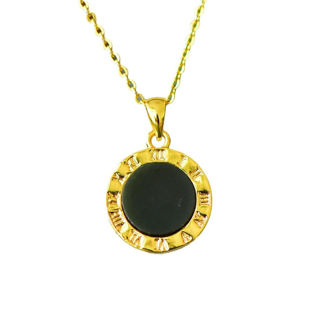 Flat gray and ink blue Hetian Jade pendant with copper inlaid decoration on a necklace.