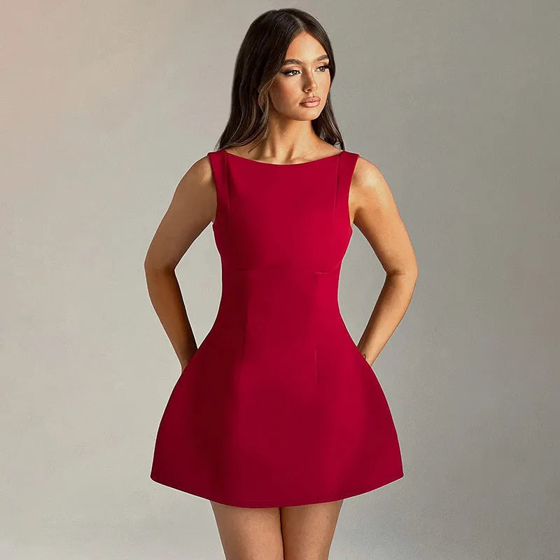 Women's black backless slim-fit summer dress with sleeveless sling straps and high waist.