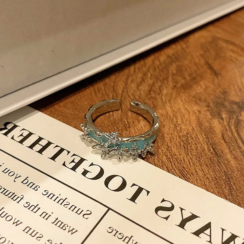 Butterfly design copper ring with oil-drip textured finish in women's jewellery