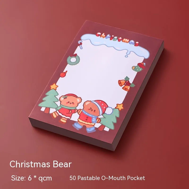 Christmas cartoon sticky notes stationery book with holiday designs including elf, gift, sled and Santa Claus