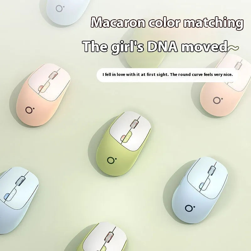 Mute dual-mode wireless Bluetooth computer mouse in Matcha Green colour on a desk.