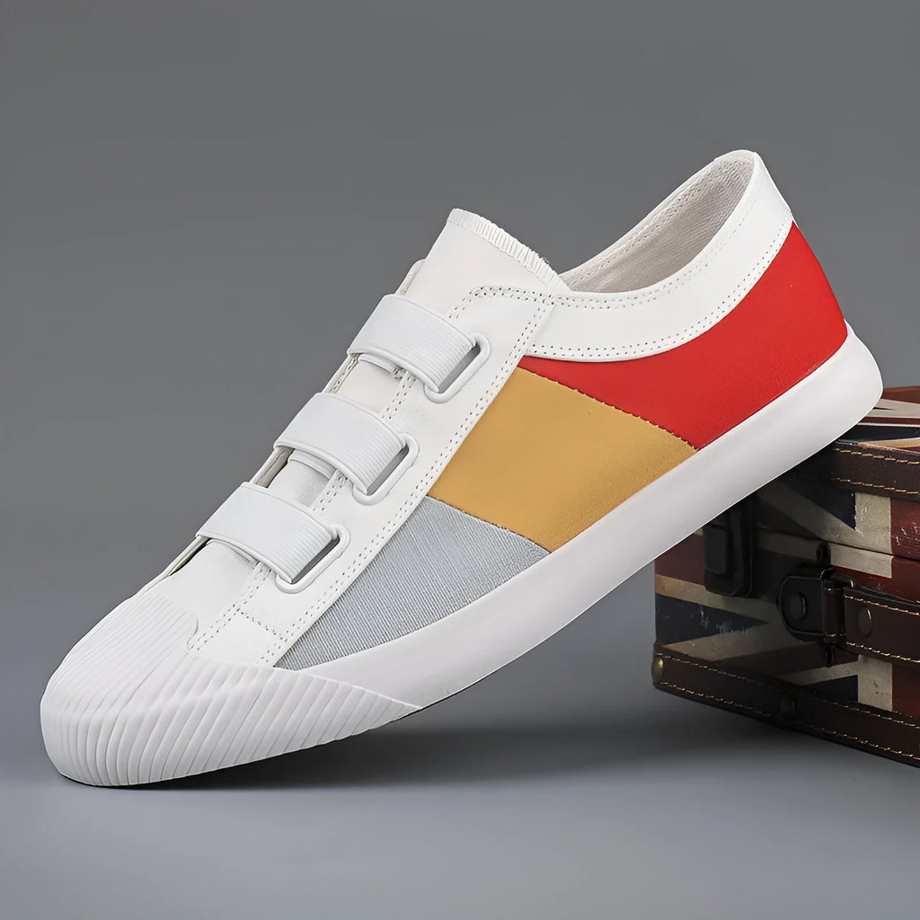 Men's beige canvas low-top sneakers with elastic band closure and a flat rubber sole