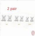S925 sterling silver stud earrings with a small crystal flower design in gold or platinum plating.