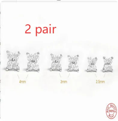 S925 sterling silver stud earrings with a small crystal flower design in gold or platinum plating.