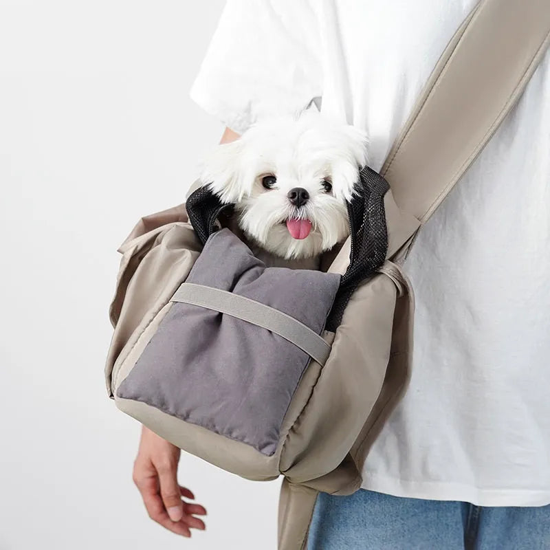 Apricot coloured cloth pet handbag measuring 41cm by 16cm by 28cm