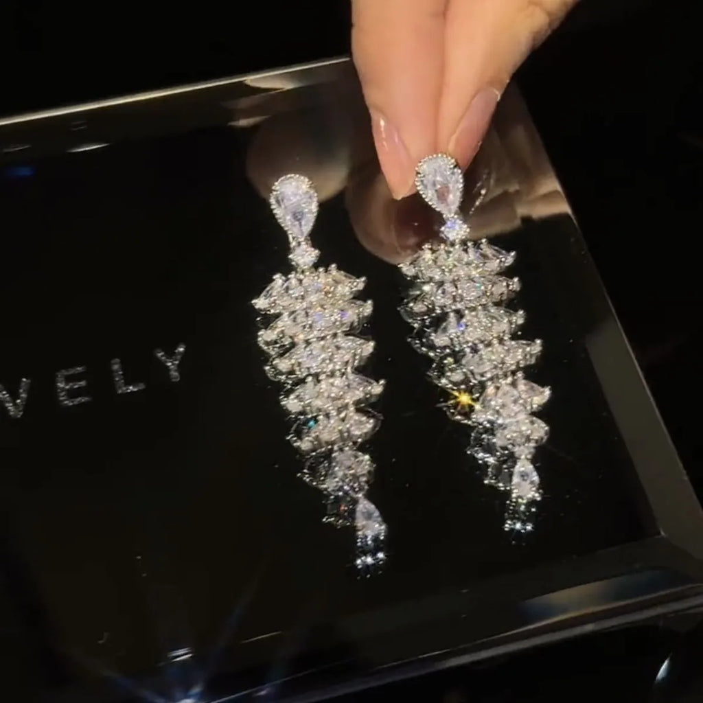 Silver pagoda Christmas tree drop earrings with sparkling zircon crystals on copper stud earrings