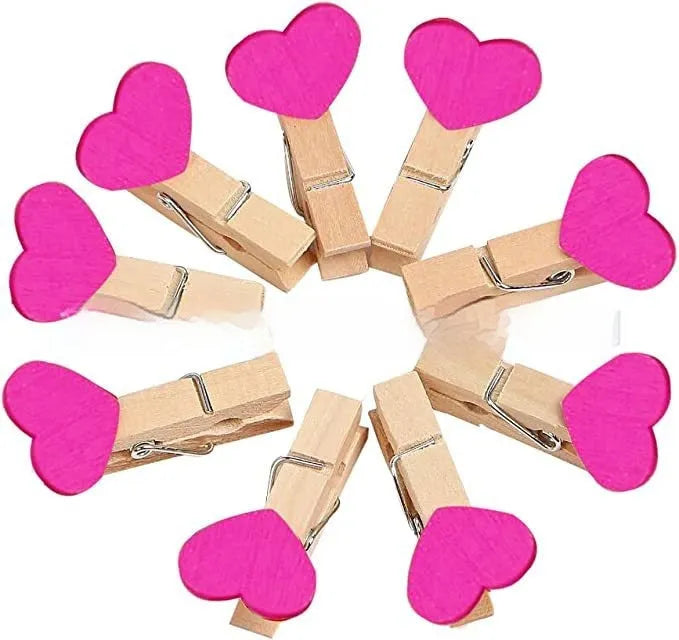 Handmade solid wood heart-shaped clips in red, rose red, and white colours measuring 3cm