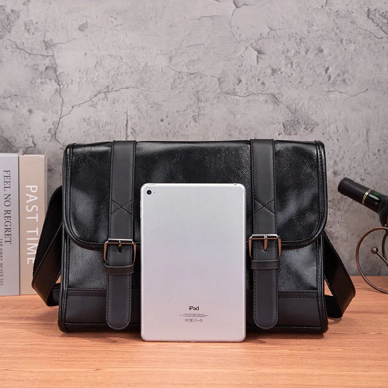 Black Korean style men's anti-theft backpack made from PU leather with visible sewing thread detailing.