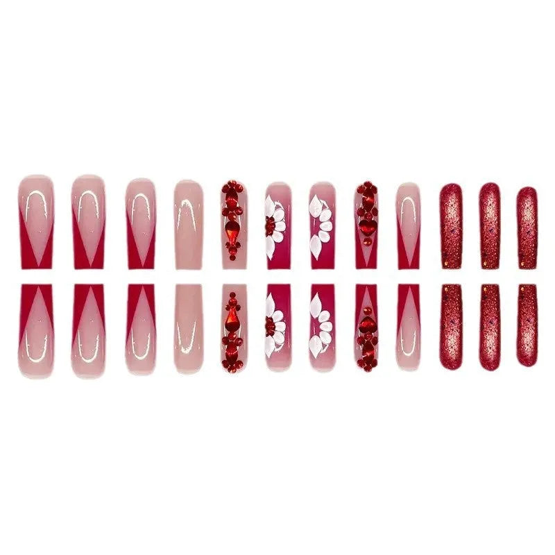 Flower-patterned artificial nails with red diamond accents in European square long shape