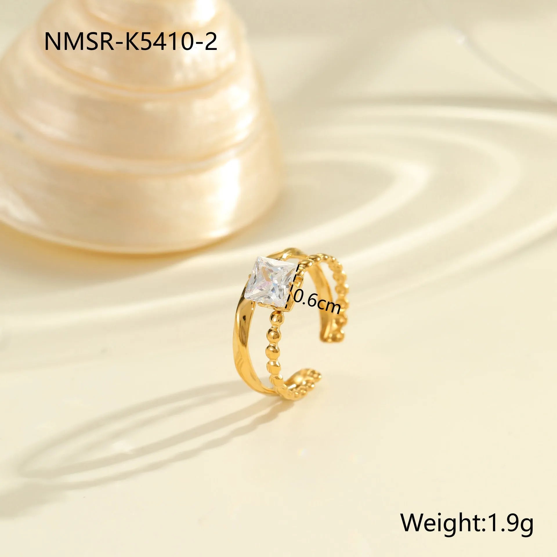 Gold electroplated stainless steel ring with zircon stones and open mouth adjustable design